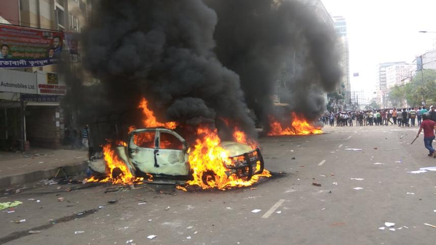 poliece van on fire.jpg